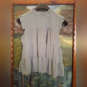 Woman blouse. Casual. Size Large.  Color olive. Excellent condition